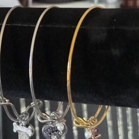The Triple Charm Bangle Collection