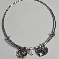 The Triple Charm Bangle Collection